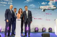 Peter Tschentscher, First Mayor of the Free and Hanseatic City of Hamburg, André Walter, Head of Airbus Commercial Aircraft Production in Germany, Anna Christmann, Federal Government Coordinator of German Aerospace Policy and Gary O'Donnell, Head of A321XLR Development, open the new A-321XLR Equipment Installation Hangar in Hamburg